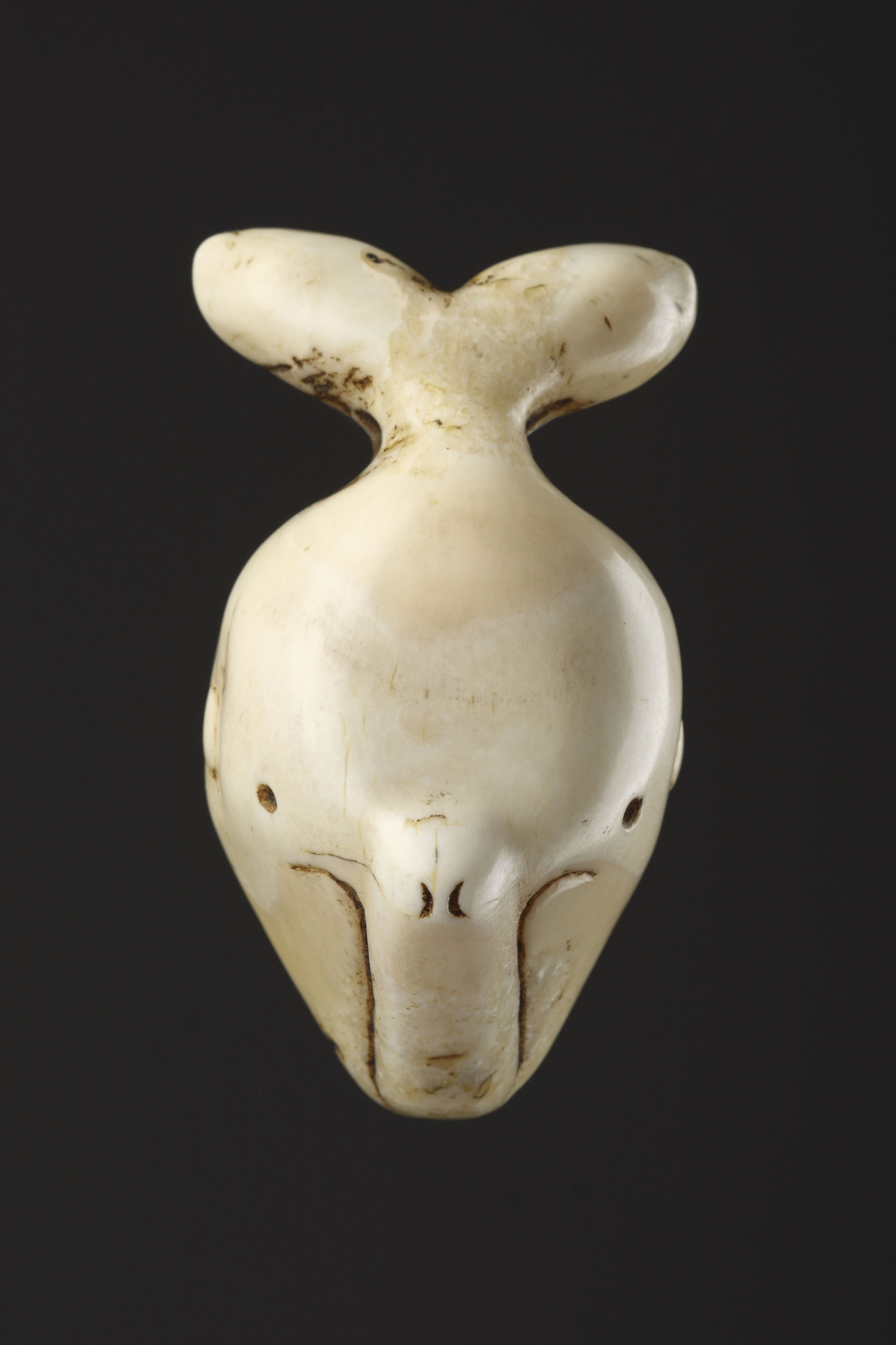 Eskimo Carved Walrus Ivory Drag Handle in the form of a Bowhead Whale